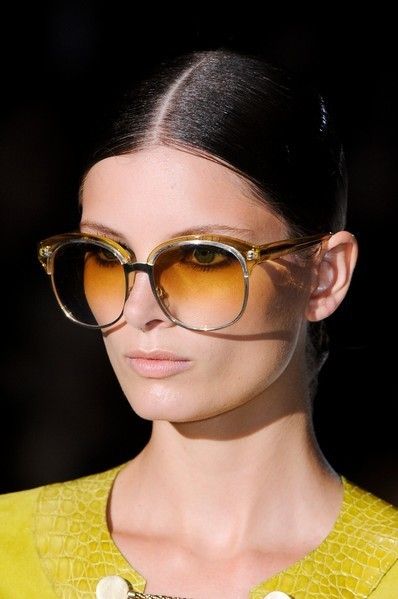 Eyewear, Glasses, Vision care, Lip, Hairstyle, Yellow, Chin, Forehead, Goggles, Eyebrow, 