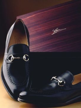 Brown, Black, Dress shoe, Tan, Material property, Design, Still life photography, Leather, Silver, Synthetic rubber, 