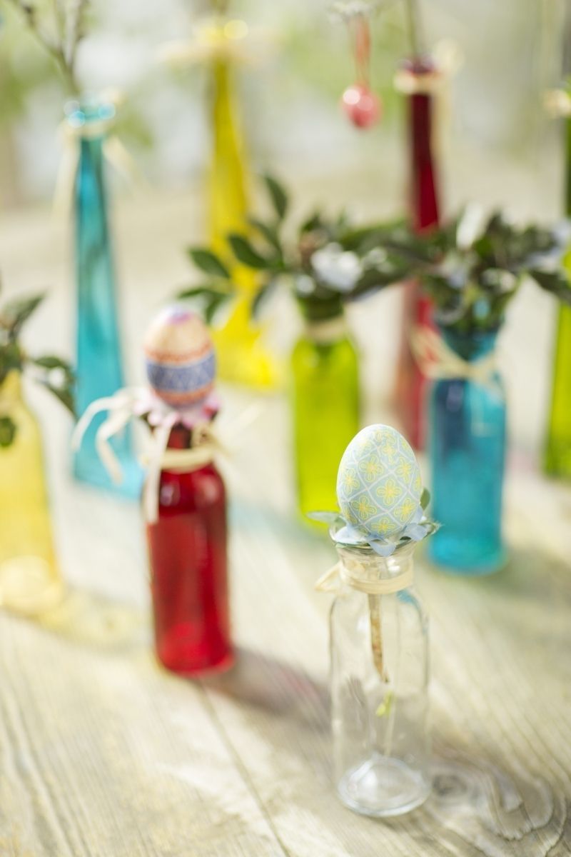 Teal, Bottle, Glass bottle, Vase, Artifact, Creative arts, Plant stem, Cut flowers, Still life photography, Flower Arranging, 