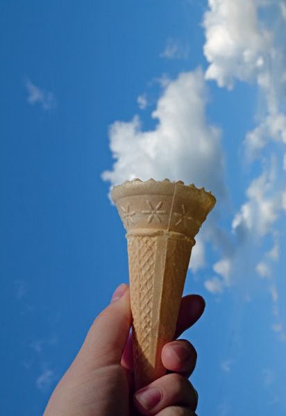 Finger, Ice cream cone, Food, Dessert, Ingredient, Ice cream, Cone, Dairy, Frozen dessert, Thumb, 