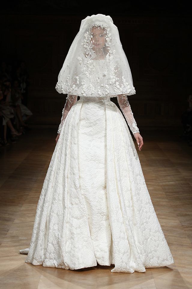 Bridal veil, Bridal clothing, Floor, Veil, Shoulder, Dress, Textile, Flooring, Photograph, Gown, 