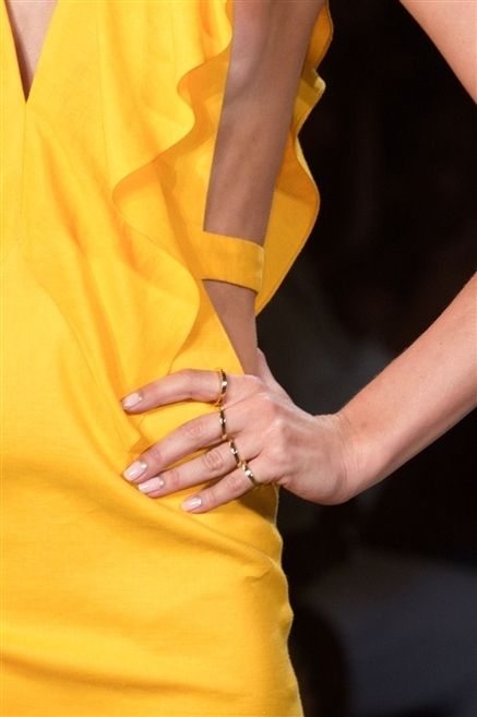 Finger, Yellow, Sleeve, Hand, Joint, Wrist, Orange, Amber, Gesture, Thumb, 