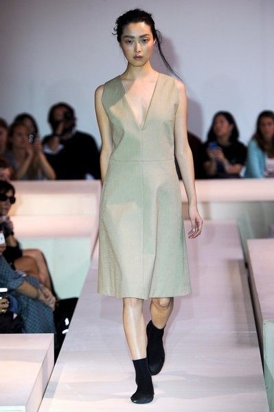 Clothing, Head, Fashion show, Event, Runway, Human body, Shoulder, Dress, Joint, Outerwear, 