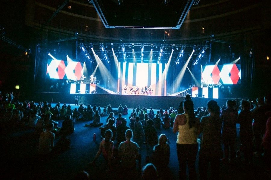 Stage, Entertainment, Stage equipment, Crowd, Performing arts, Display device, Audience, Music venue, Performance, Public event, 