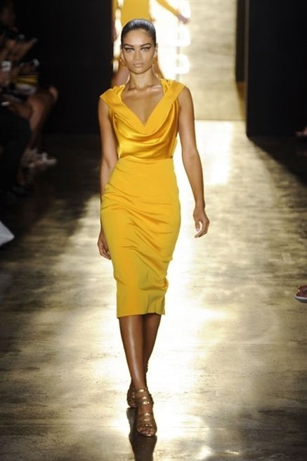 Clothing, Yellow, Shoulder, Fashion show, Dress, Human leg, Joint, Style, Fashion model, One-piece garment, 