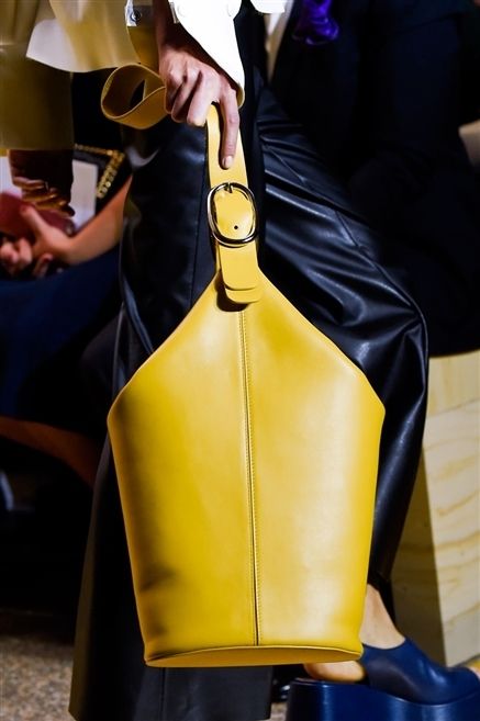 Yellow, Style, Fashion, Leather, Bag, Street fashion, Material property, Hobo bag, Fashion design, Latex clothing, 