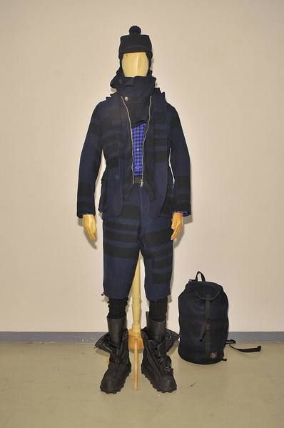Costume accessory, Fashion, Bag, Costume design, Costume, Fur, Leather, Fictional character, Baggage, Pocket, 