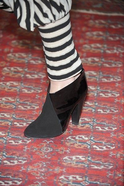 Floor, Costume accessory, Sock, Close-up, Court shoe, Ankle, 