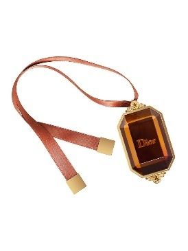 Product, Amber, Tan, Pendant, Metal, Rectangle, Body jewelry, Symbol, Keychain, Still life photography, 