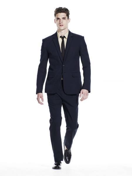 Clothing, Coat, Dress shirt, Collar, Sleeve, Trousers, Human body, Shoulder, Suit trousers, Standing, 