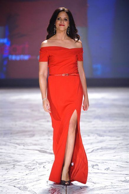 Hairstyle, Fashion show, Shoulder, Dress, Joint, Red, Fashion model, High heels, Waist, Runway, 