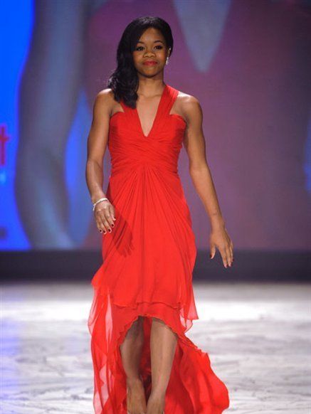 Hairstyle, Shoulder, Dress, Fashion show, Shoe, Joint, Red, High heels, Style, Fashion model, 