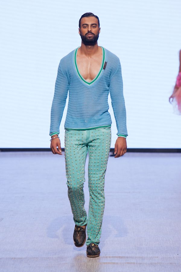 Blue, Leg, Sleeve, Trousers, Green, Human body, Shoulder, Textile, Fashion show, Joint, 