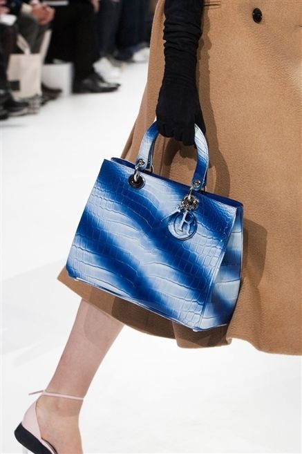 Blue, Brown, Bag, Textile, Joint, Outerwear, Human leg, Style, Luggage and bags, Electric blue, 