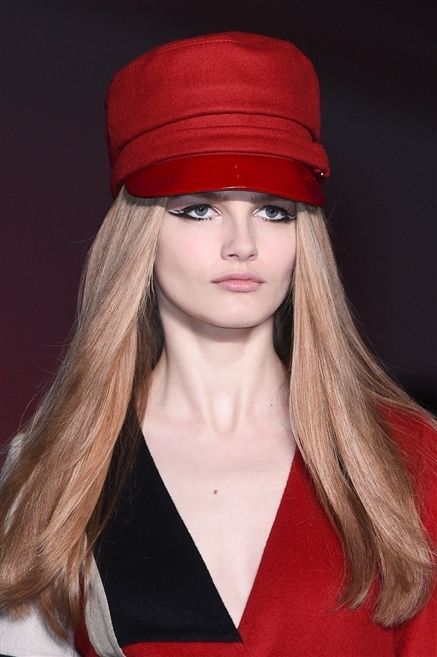 Lip, Hairstyle, Chin, Red, Style, Headgear, Beret, Costume accessory, Fashion accessory, Fashion, 