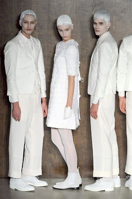 Sleeve, White, Standing, Formal wear, Headgear, Fashion, Fashion design, Suit trousers, Fashion model, One-piece garment, 