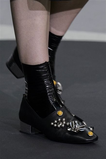 Human leg, Joint, Fashion, Black, Leather, Calf, Fashion design, Boot, Silver, Sock, 