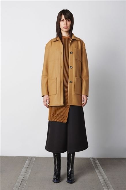 Clothing, Brown, Sleeve, Human body, Shoulder, Coat, Textile, Collar, Joint, Standing, 