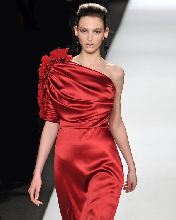 Clothing, Dress, Shoulder, Joint, Red, Fashion model, Earrings, One-piece garment, Style, Formal wear, 