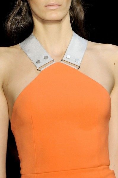 Clothing, Hairstyle, Shoulder, Joint, Collar, Orange, Style, Amber, Chest, Beauty, 