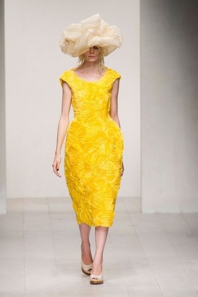 Yellow, Human leg, Shoulder, Textile, Joint, Dress, One-piece garment, Amber, Costume design, Fashion, 