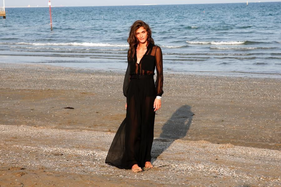 Coastal and oceanic landforms, Dress, Ocean, Summer, Beach, Coast, Shore, Formal wear, People in nature, Vacation, 