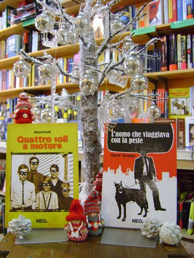 Shelving, Shelf, Christmas decoration, Canidae, Christmas, Publication, Advertising, Bookcase, Dog breed, Companion dog, 