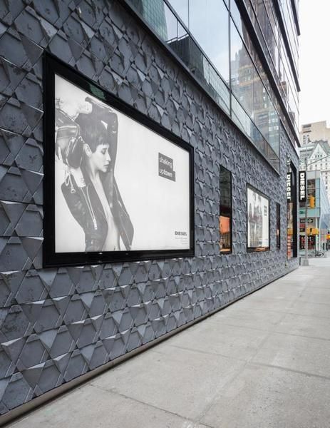 Wall, Facade, Advertising, Picture frame, Concrete, Visual arts, Urban design, Signage, Commercial building, Painting, 