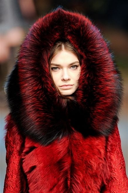 Lip, Red, Textile, Fur clothing, Natural material, Winter, Fashion, Fashion model, Maroon, Animal product, 