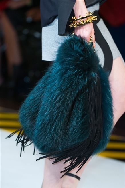 Blue, Textile, Natural material, Feather, Costume accessory, Teal, Fashion, Wrist, Animal product, Electric blue, 