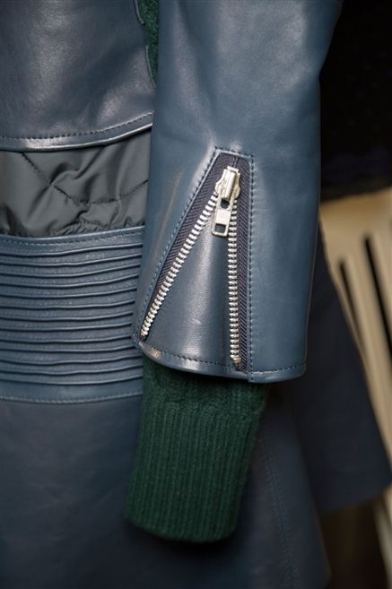 Textile, Leather, Musical instrument accessory, Zipper, Leather jacket, Ammunition, Silk, Pocket, 