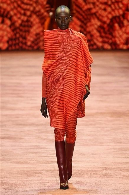Textile, Joint, Red, Orange, Fashion show, Runway, Fashion, Street fashion, Fashion model, Fashion design, 