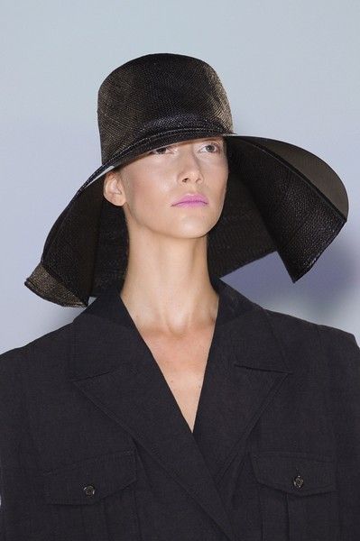 Lip, Sleeve, Collar, Formal wear, Headgear, Hat, Blazer, Costume accessory, Fashion, Black, 