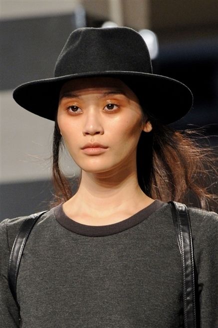 Clothing, Lip, Hat, Hairstyle, Sleeve, Chin, Shoulder, Style, Fashion accessory, Black hair, 
