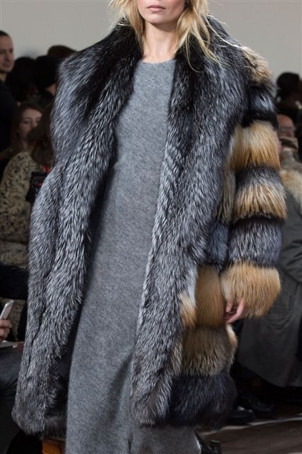 Human, Skin, Fashion show, Textile, Fur clothing, Outerwear, Winter, Jacket, Style, Fashion model, 