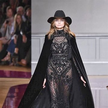 Human, Hat, Formal wear, Gown, Costume design, Fashion, Fashion model, Costume accessory, Long hair, Haute couture, 
