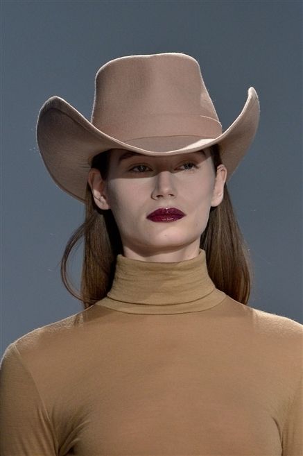 Clothing, Hat, Lip, Brown, Sleeve, Chin, Shoulder, Joint, Fashion accessory, Style, 