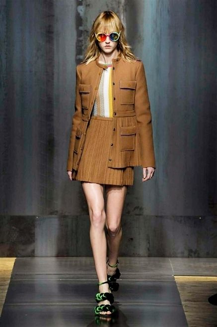 Clothing, Brown, Coat, Shoulder, Human leg, Joint, Outerwear, Fashion model, Fashion show, Style, 