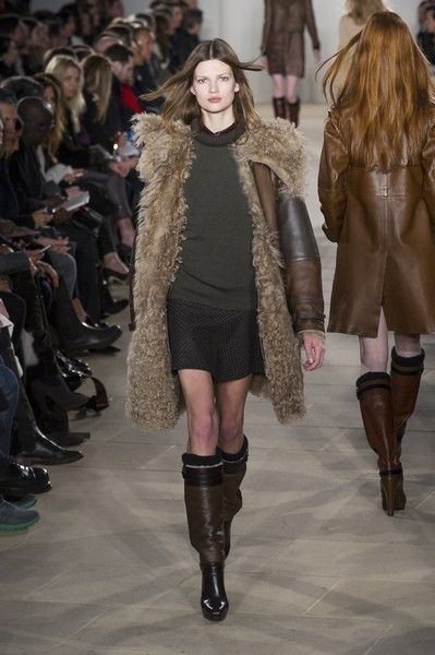 Clothing, Footwear, Human, Leg, Brown, Fashion show, Textile, Joint, Outerwear, Coat, 