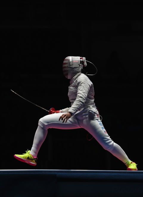 Shoe, Elbow, Standing, Fencing, Carmine, Helmet, Sneakers, Foil, Safety glove, Individual sports, 