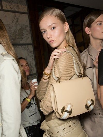 Hair, Face, Nose, Human body, Khaki, Bag, Fashion, Waist, Beige, Belt, 