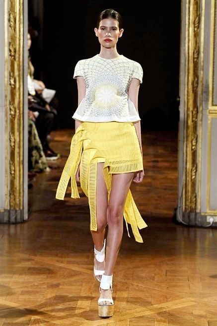 Clothing, Yellow, Shoulder, Fashion show, Human leg, Textile, Joint, Floor, Waist, Style, 