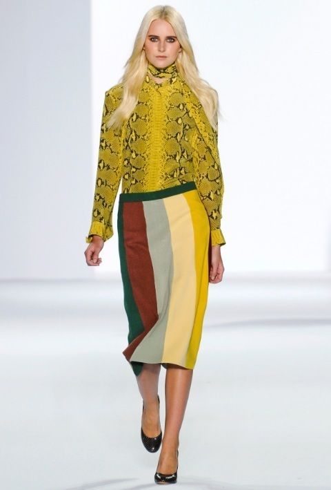 Clothing, Footwear, Yellow, Sleeve, Human body, Shoulder, Joint, Outerwear, Fashion show, Style, 