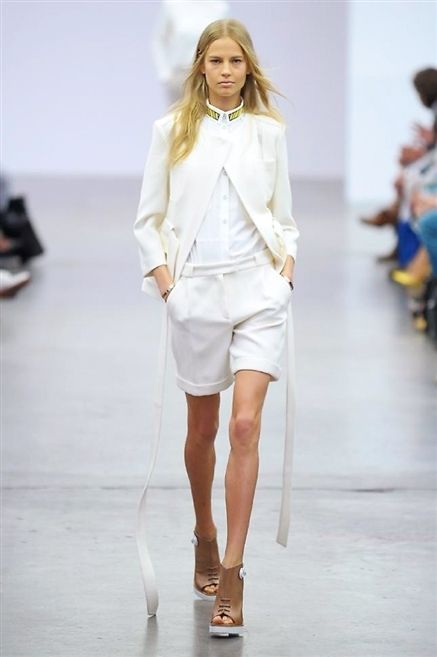 Product, Fashion show, Sleeve, Shoulder, Human leg, Runway, Joint, Outerwear, White, Fashion model, 