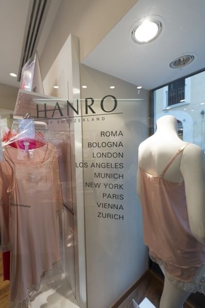 Lighting, Retail, Mannequin, Ceiling, Display window, Dress, Fixture, Fashion, Display case, Boutique, 