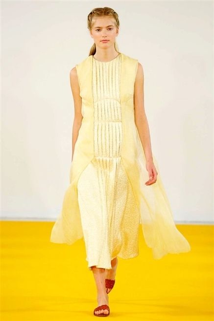 Yellow, Shoulder, Textile, Shoe, Joint, Dress, Flooring, One-piece garment, Style, Formal wear, 