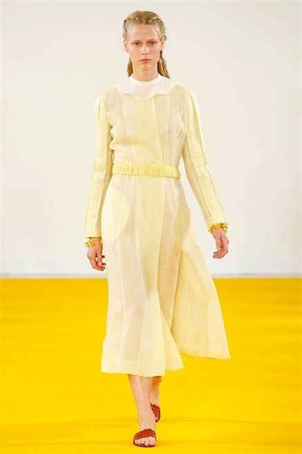 Yellow, Sleeve, Shoulder, Textile, Flooring, Dress, One-piece garment, Formal wear, Style, Floor, 