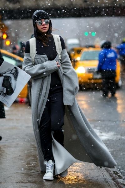 Winter, Road surface, Street fashion, Bag, Costume design, Costume, Glove, Precipitation, Overcoat, Traffic, 