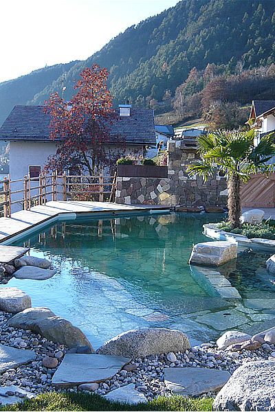 Landscape, Natural landscape, Mountain range, Hill station, Swimming pool, Resort town, Resort, Water feature, Valley, Village, 