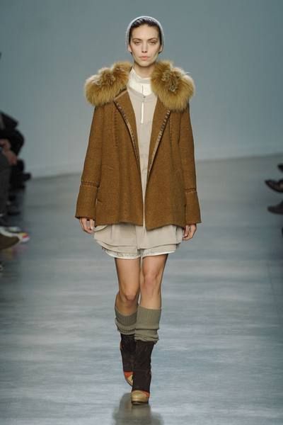 Human, Fashion show, Brown, Sleeve, Human body, Winter, Shoulder, Runway, Joint, Outerwear, 